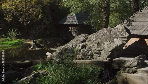 Traditional water mill for grinding in Romania, autumn, 4k photo