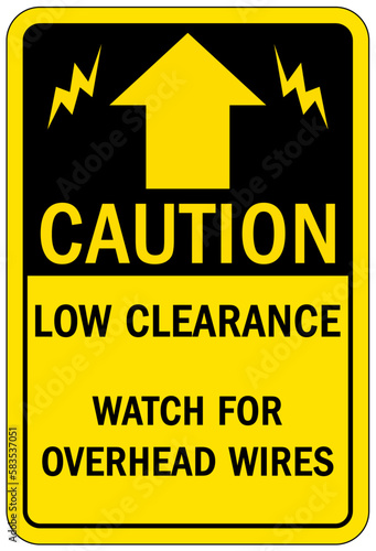 Low clearance warning sign and labels watch overhead wires