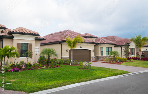 Cloudy, stormy day in South Florida luxury golf community. Real estate background