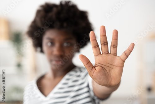 Принти на полотні Closeup of african woman's hand making stop sign