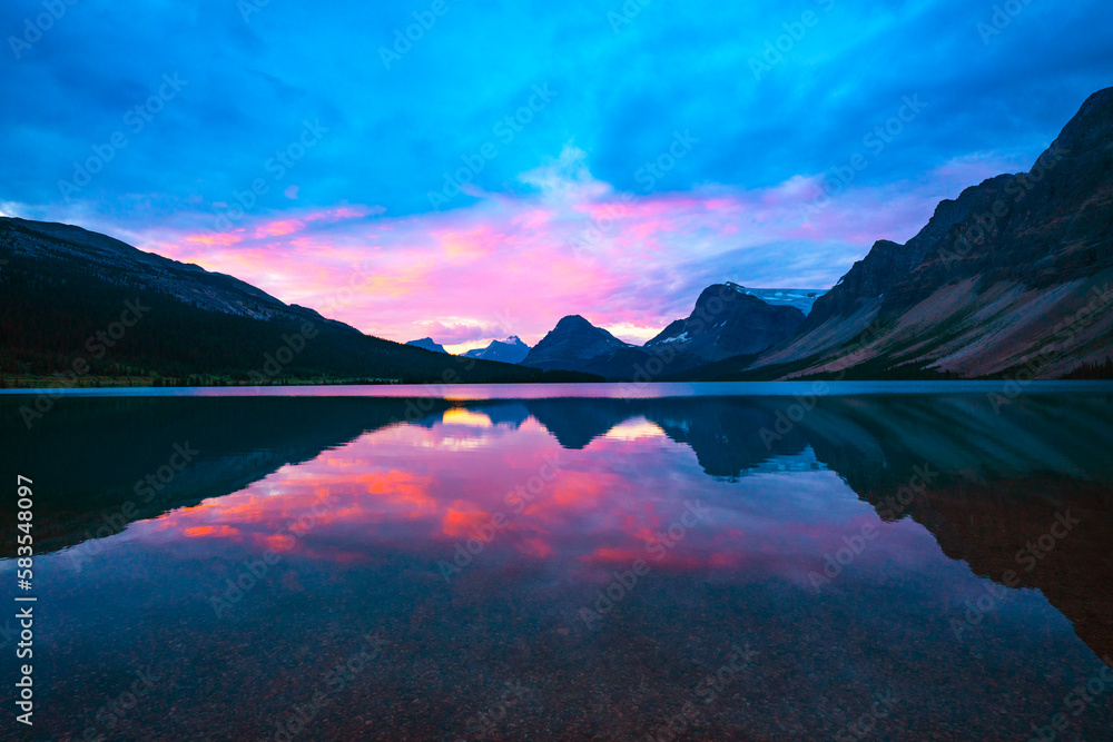Pink Sunrise Over Mountain Calm Lake