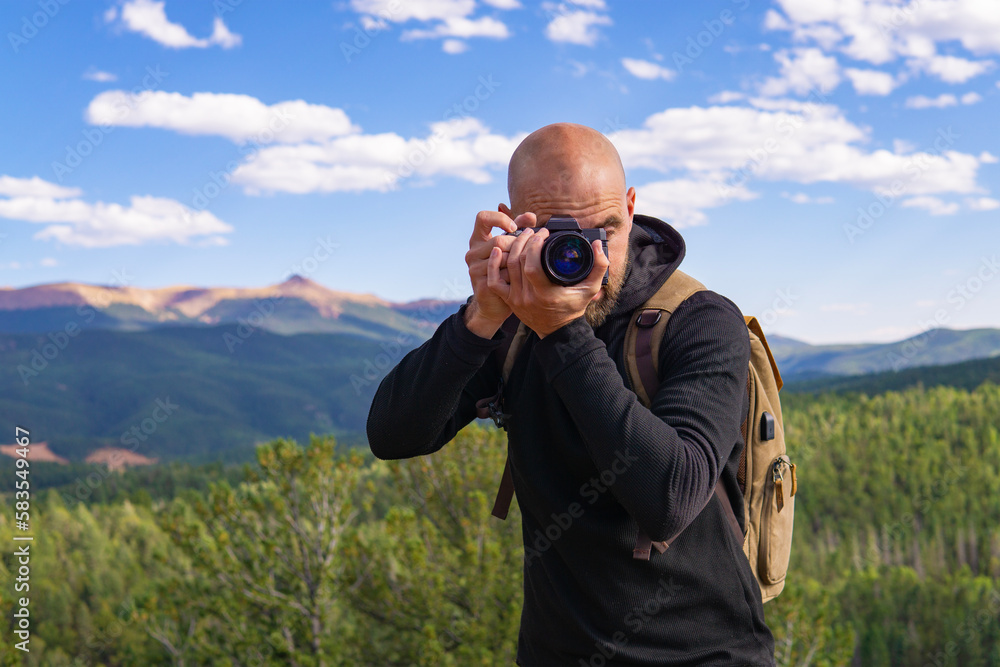 Male Landscape Photographer On Mountain Male Landscape Photographer On Mountain