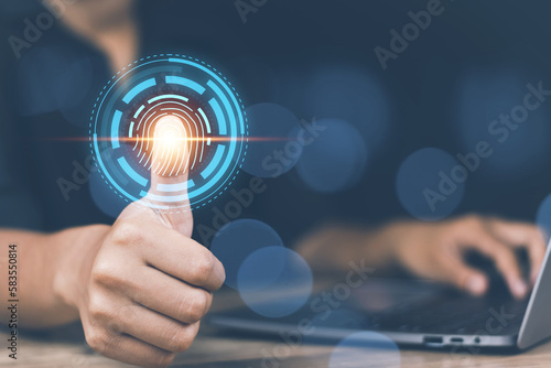 cyber security concept, man's hand scanning finger to go online to access information both accessing the system document storage Banking including online shopping This method is highly secure.