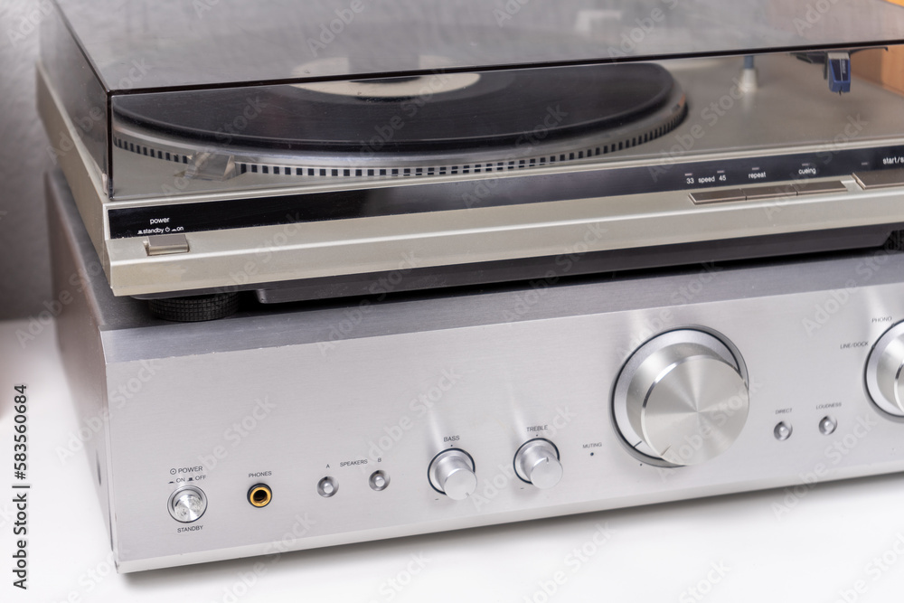 Fototapeta premium cropped view of vintage vinyl player and amplifier