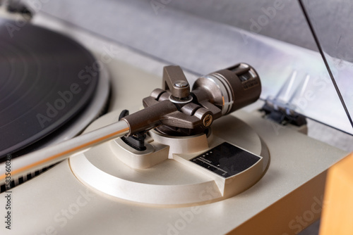closeup view on vintage vinyl record player with stylus