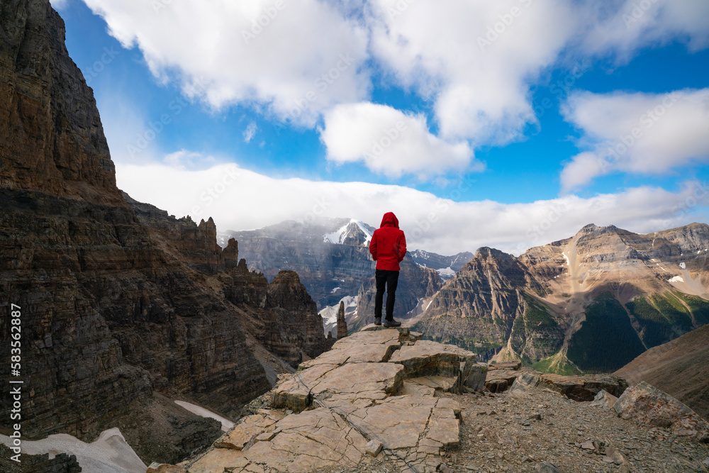 Man Standing In Mountain Panorama View