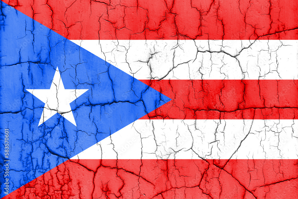 Flag of Puerto Rico on cracked wall, textured background.