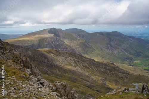 Aerial view of the Ogwen mountain range in Snowdon in Wales, on a cloudy day