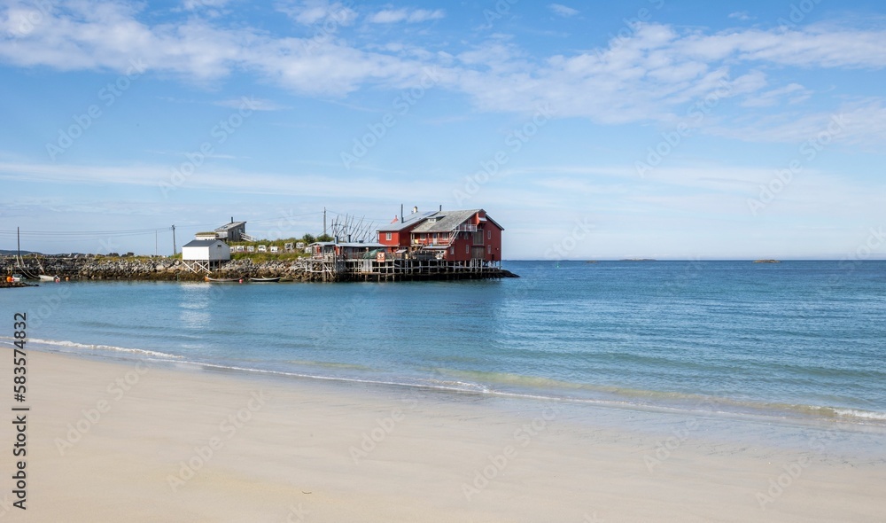 Coastline with a building on the wooden pier
