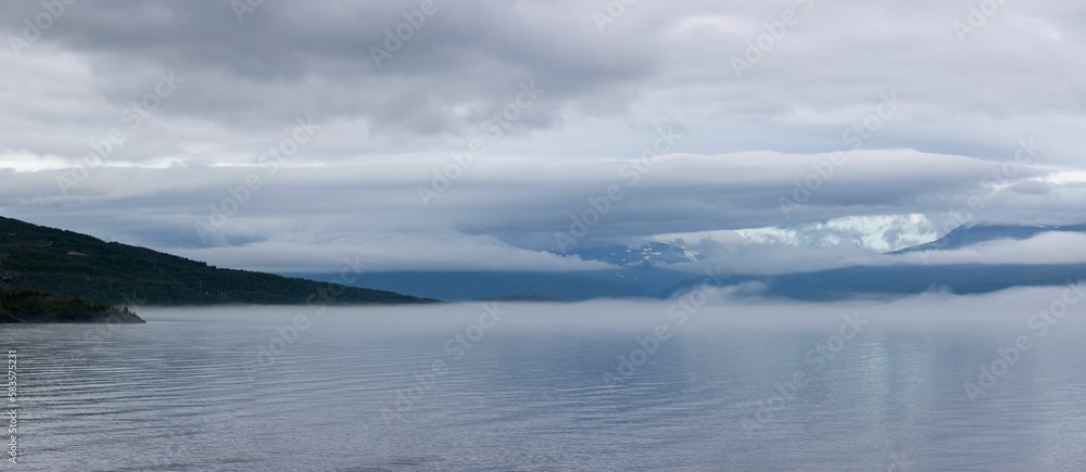 Panoramic aerial view of a calm sea on a cloudy day
