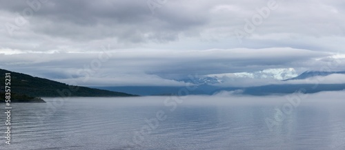 Panoramic aerial view of a calm sea on a cloudy day
