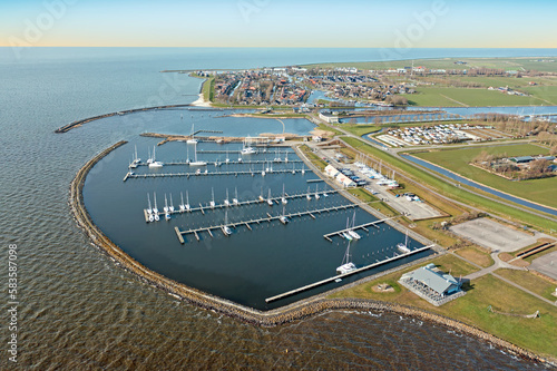 Aerial from the harbor and city Stavoren in the Netherlands photo