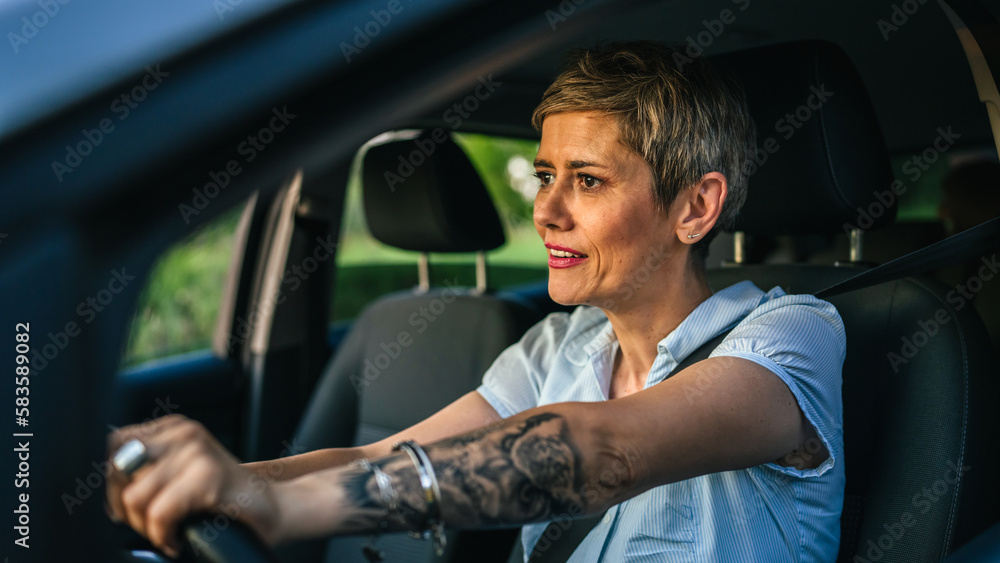 Stressed angry mature senior woman in driver's seat car frustration Stressed angry mature senior woman in driver's seat car frustration