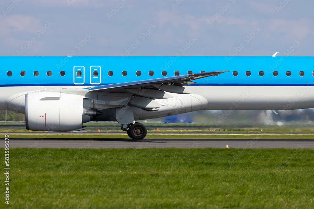 Passenger plane taking off from the runway, Schiphol, Amsterdam, The Netherlands