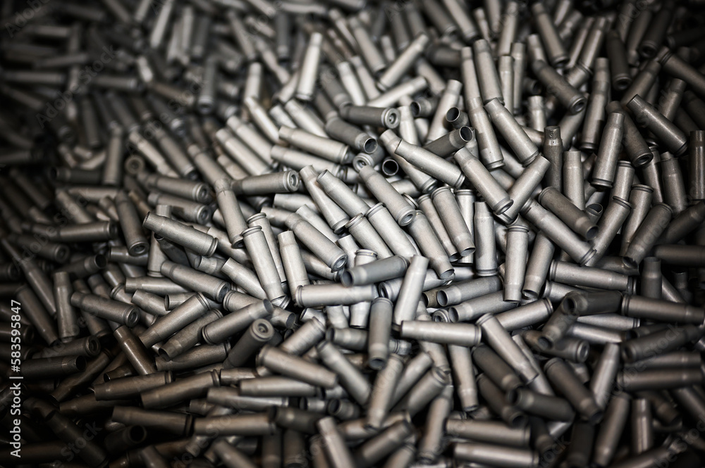 Bullet casings heap as background black and white effect Bullet casings heap as background black and white effect