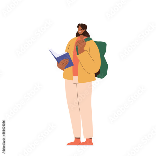 Happy smiling female student reading book while standing with bag isolated on white background