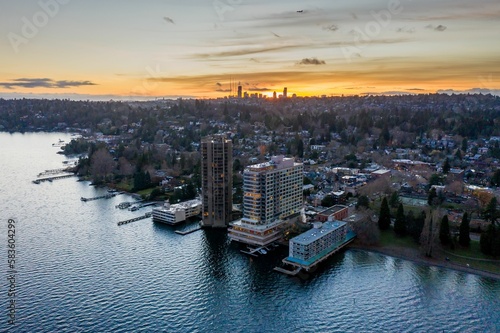 Cityscape of Seattle surrounded by the sea in the evening