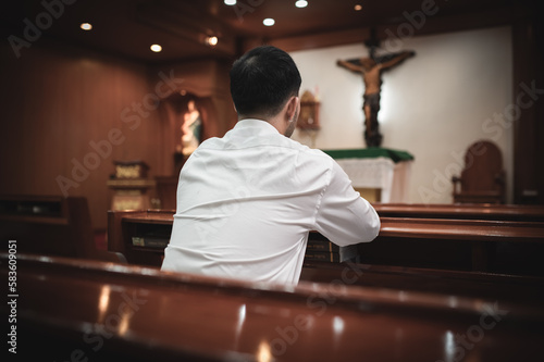 Christian man asking for blessings from God,Asian man praying to Jesus Christ