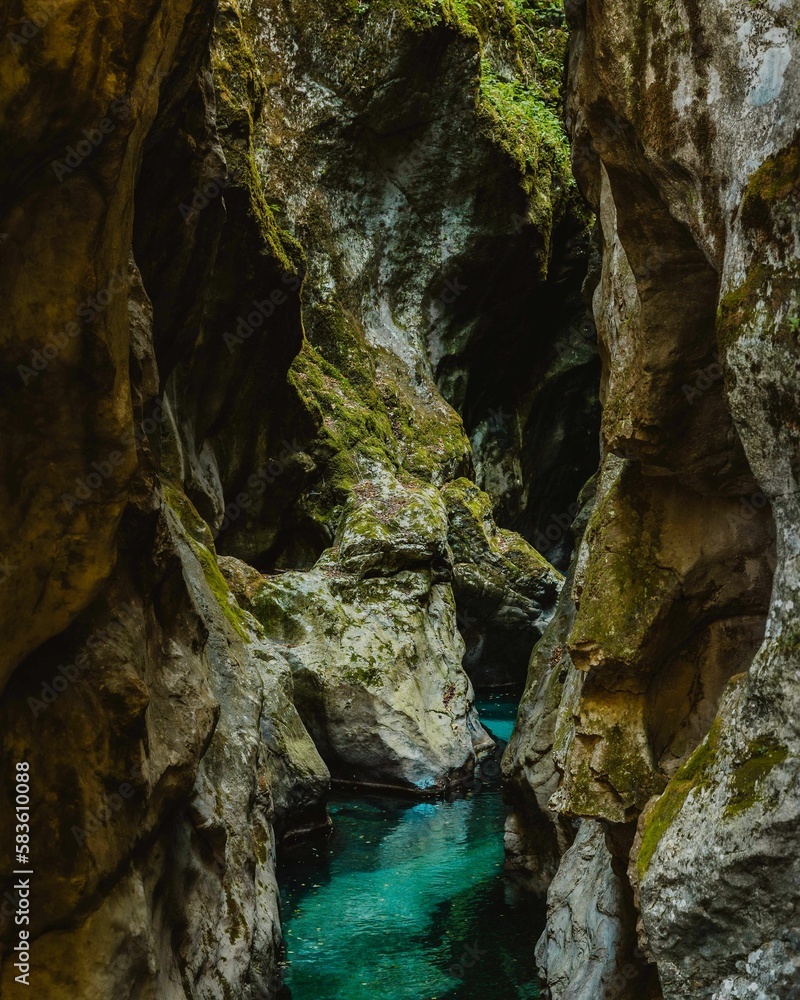 Scenic view of a small river with turquoise water in Tolmin Gorges park in Zatolmin, Slovenia