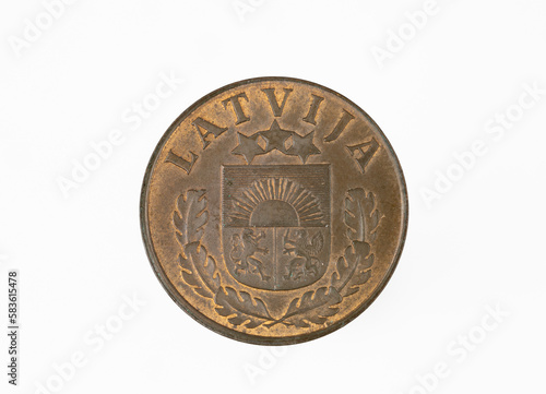 Two Latvian santimi coin (1939) isolated on white background