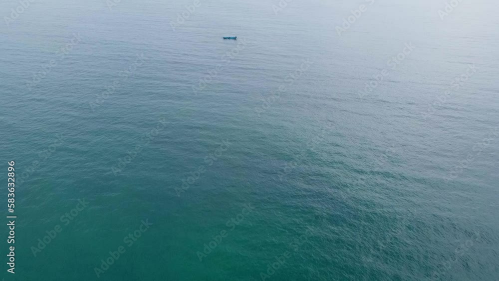 Aerial view of a fishing boat with fish and a net. Calm beautiful video on the background for tourism, design and advertising. Aerial view of a fishing boat with fish and a net. Calm beautiful video on the background for tourism, design and advertising.