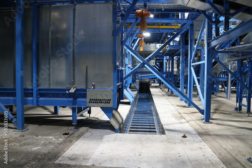 conveyors with waste at the plant for their processing