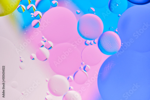 Bright abstract, multicolored background with oil circles.