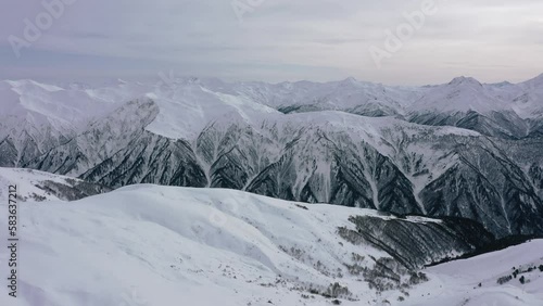 Wallpaper Mural Stunning mountain scenery in winter. Mountain peaks and valleys, spruce trees covered with snow, drone view Torontodigital.ca