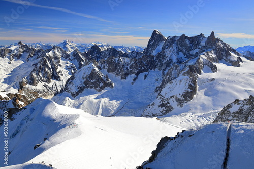 View of the glacier valley of the Mont Blanc massif seen from the Aiguille du Midi. French Alps, Europe. © eugen_z