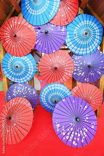 Composition of colorful traditional japanese paper umbrellas