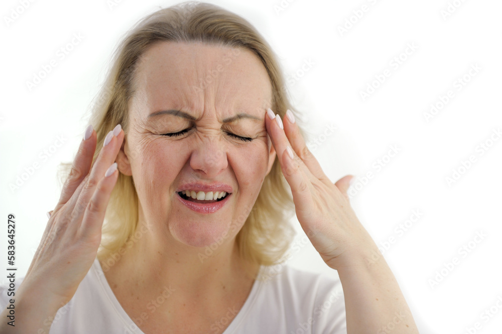 Old woman with a headache holds her hands to her temples Attractive woman having a headache on white background. High quality photo Old woman with a headache holds her hands to her temples Attractive woman having a headache on white background. High quality photo
