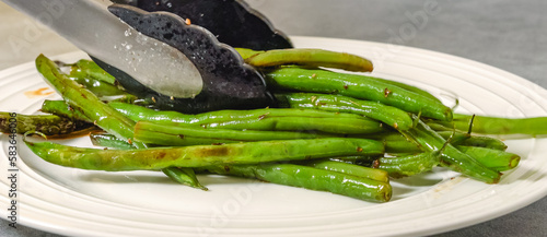 Pan fried French green beans (Haricots Verts) recipe. String beans close-up