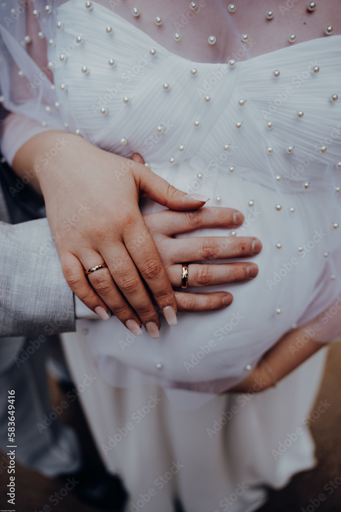 hands of bride and groom