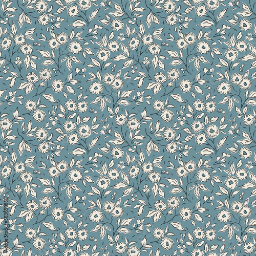 Vector seamless pattern. Pretty pattern in small flowers. Small white flowers. Light blue background. Ditsy floral background. The vintage template for fashion prints. Stock vector.