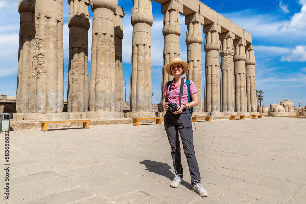 Woman tourist at Luxor Temple