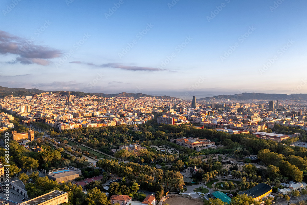 Aerial view of Parque de la Ciutatdella and Barcelona, Spain with Basilica Sagrada Familia in background