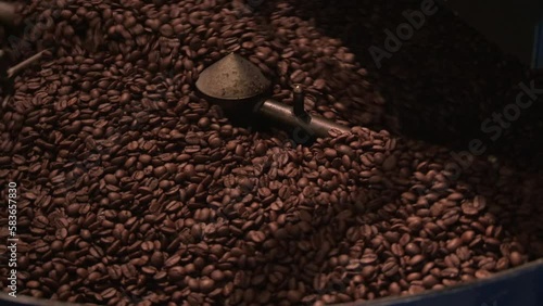 Coffee beans rotating in drum roaster