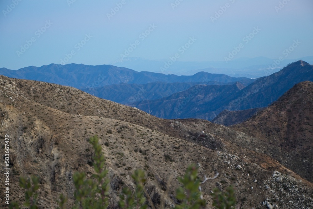 The sun sets and dusk falls on the Angeles Crest Highway, a winding route through the San Gabriel Mountains and Angeles National Forest just north of Los Angeles