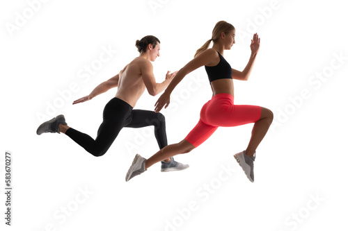 sport couple running isolated on white. sport couple running in studio.