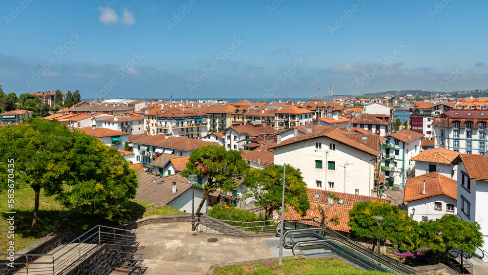 Roof top view of the coastal city of Hondarribia under a blue sky, Guipuzcoa, Basque Country, Spain