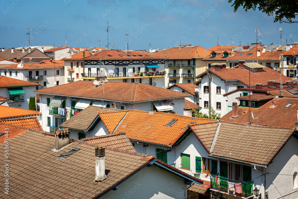 Obraz premium Roof top view of the coastal city of Hondarribia under a blue sky, Guipuzcoa, Basque Country, Spain