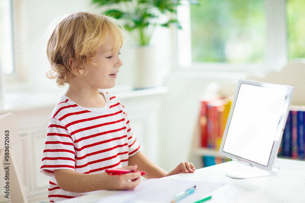Child doing school homework. Online learning. Child doing school homework. Online learning.