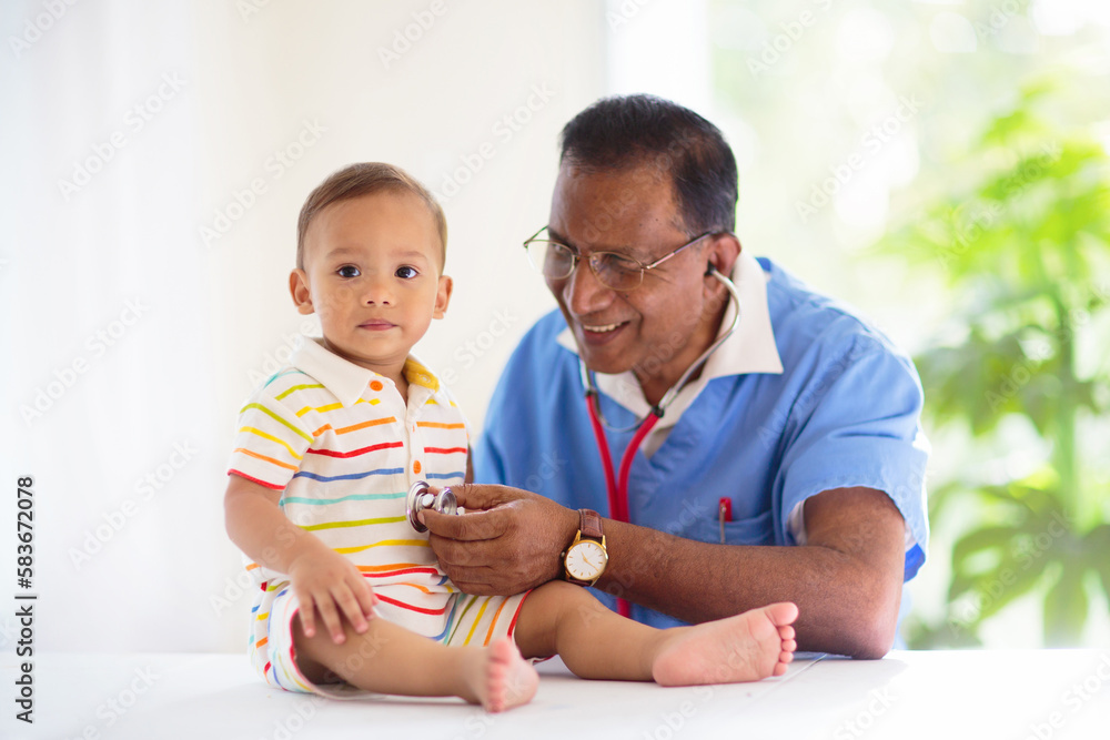 Doctor examining baby. Pediatrician with patient. Doctor examining baby. Pediatrician with patient.