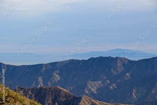 The winding Angeles Crest Highway provides views over the Los Angeles Basin and surrounding urban valleys, the snow-dusted San Gabriel and San Bernandino Mountains and the Mojave Desert