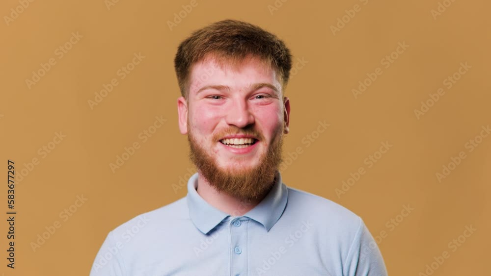 A teenage guy with fiery red hair strikes a pose in the photo studio, A teenage guy with fiery red hair strikes a pose in the photo studio,