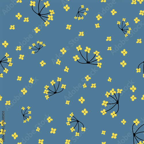 Simple and cute yellow ditsy flowers on navy blue background, abstract pattern