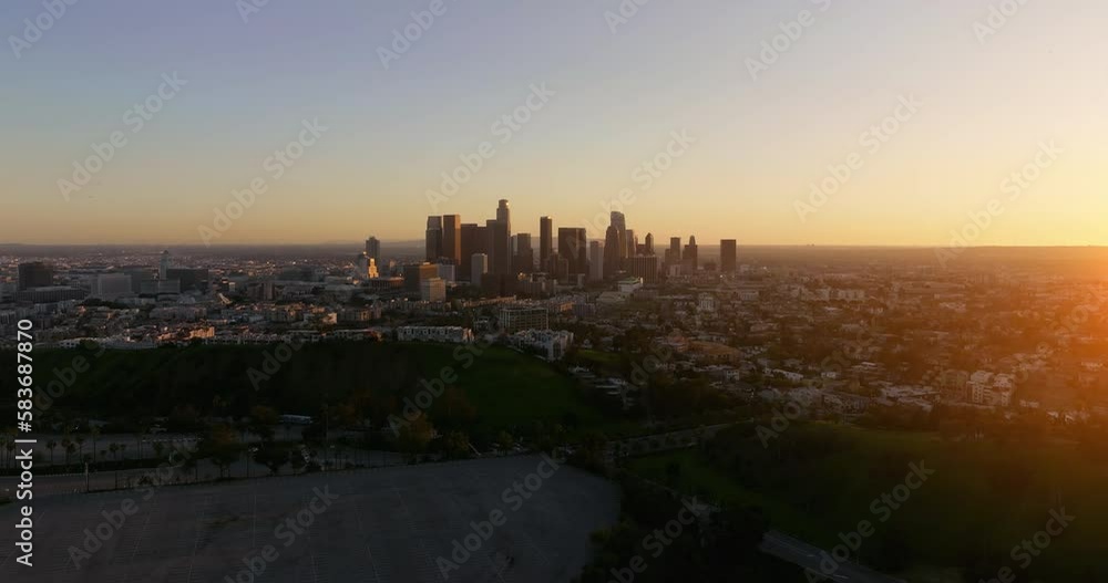 Aerial of downtown Los Angeles in dawn, sunset in California, skyscrapers and office buildings, golden light. Cinematic urban aerial time lapse of downtown Los Angeles city skyline with skyscrapers. Aerial of downtown Los Angeles in dawn, sunset in California, skyscrapers and office buildings, golden light. Cinematic urban aerial time lapse of downtown Los Angeles city skyline with skyscrapers.