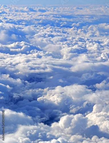 Clouds photographed from an airplane window