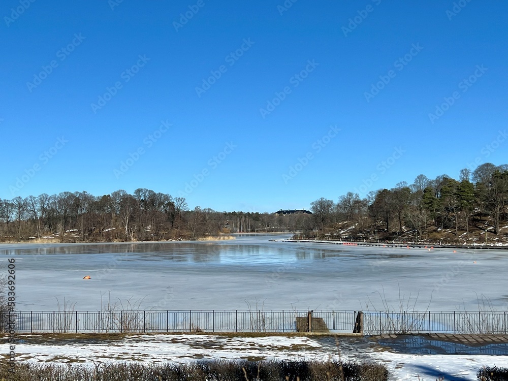 Beautiful winter lake with frozen ice taken outside of Stockholm, Sweden.