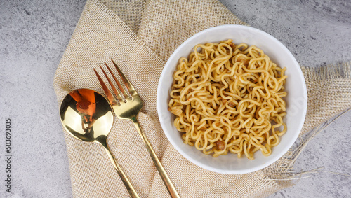 Instant noodles in white bowl. selective focus